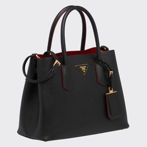 Ladies Prada tote bag, hardly used. Comes with original dust bag and all tags